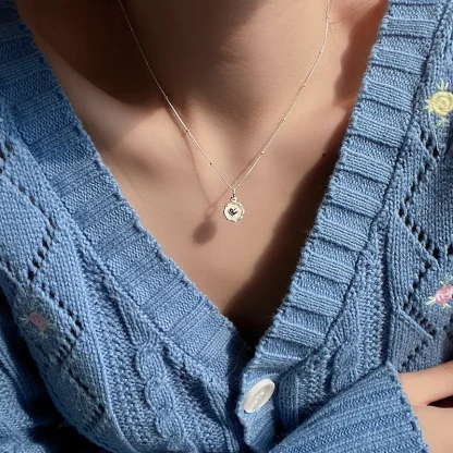 Elegant Necklace with Embossed Heart Design - Image 4