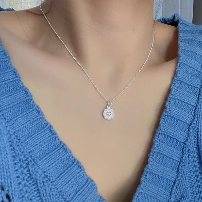 Elegant Necklace with Embossed Heart Design - Image 2